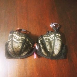 Nude and black lace bra